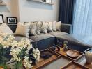 Modern living room with gray sofa and decorative items