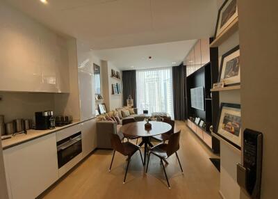 Modern living room with dining area and kitchen