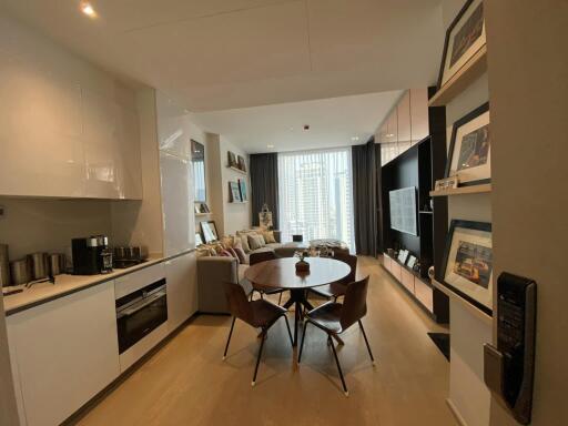 Modern living room with dining area and kitchen