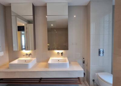 Modern bathroom with double sinks and mirrors