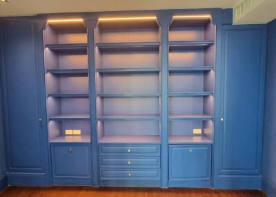 Blue built-in shelves