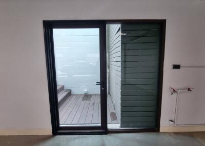 Glass door leading to outdoor patio