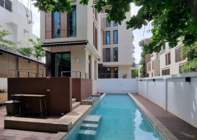 Modern apartment with pool and patio