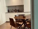 Modern kitchen with dining table