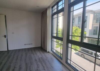 Spacious living room with large windows