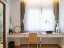 Bright bedroom with a study desk by the window