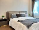 Modern bedroom with double bed and bedside tables