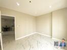 Bright living space with marble flooring and recessed lighting