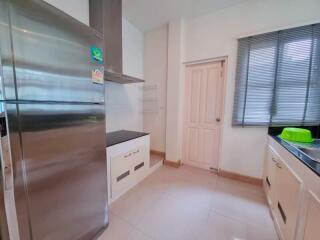 Modern kitchen with stainless steel appliances