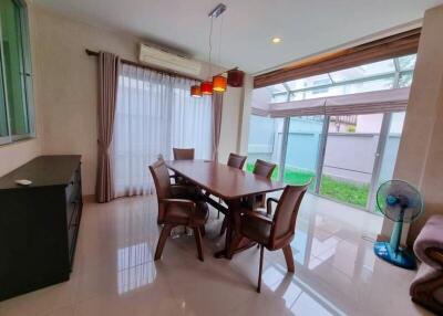 Well-lit dining room with modern furniture