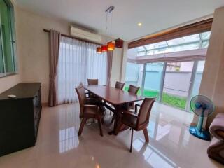 Well-lit dining room with modern furniture