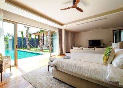 Spacious bedroom with pool view