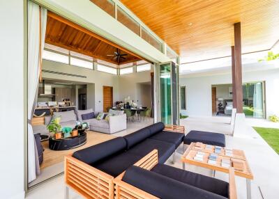 Modern open-concept living area with adjoining indoor and outdoor spaces