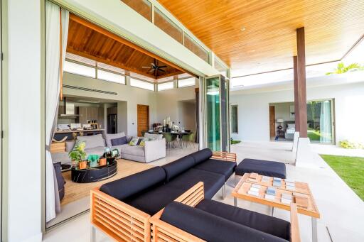 Modern open-concept living area with adjoining indoor and outdoor spaces