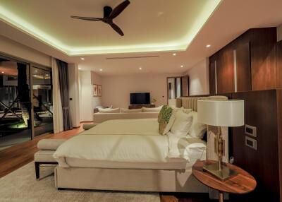 Spacious bedroom with modern design and ambient lighting