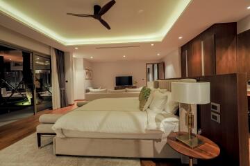 Spacious bedroom with modern design and ambient lighting