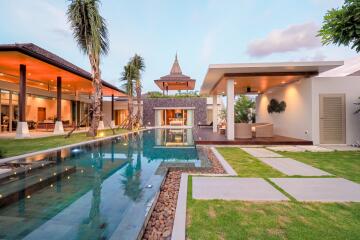 Beautiful outdoor area with pool, patio, and garden