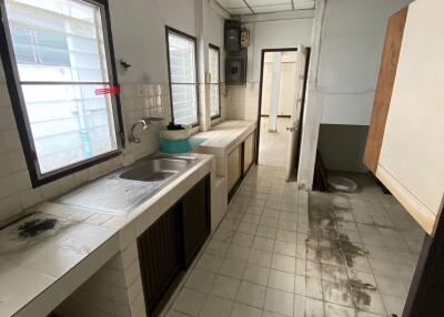 Old kitchen with sink and counter space