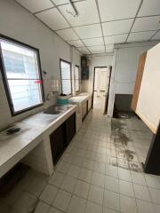 Old kitchen with sink and counter space