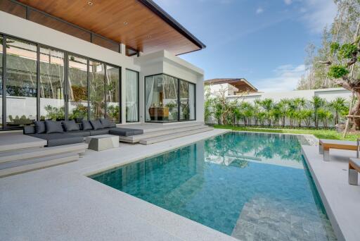 Modern outdoor area with pool and seating