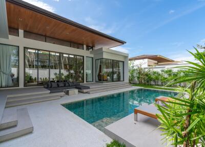 Modern outdoor area with pool and seating