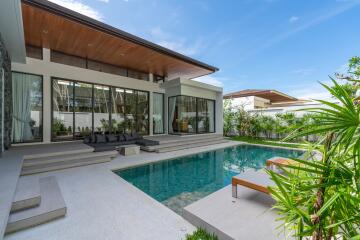 Modern outdoor area with pool and seating