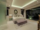 Modern bedroom with large mirrors and ambient lighting