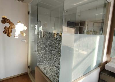 Modern bathroom with glass shower enclosure