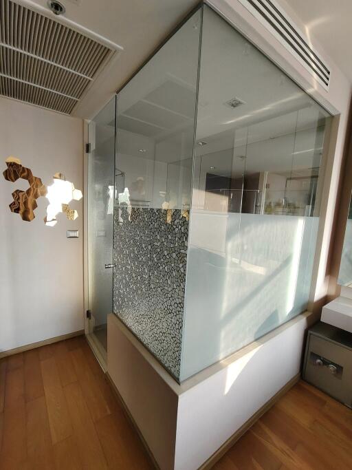 Modern bathroom with glass shower enclosure