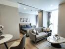 Modern living room and bedroom combo with elegant furnishings