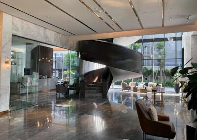 modern lobby with spiral staircase