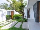 Modern house exterior with garden and pathway