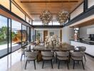 Spacious dining area with large glass windows and modern chandeliers