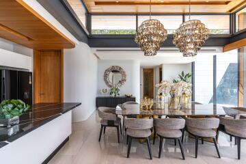 Stylish dining area with large windows and modern decor