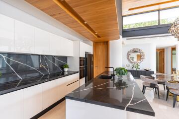 Modern kitchen with island and dining area