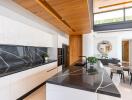 Modern kitchen with island and dining area