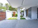 Modern outdoor area with driveway and entrance