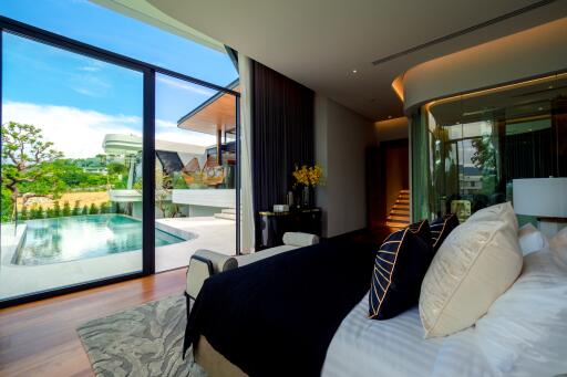 Modern bedroom with pool view