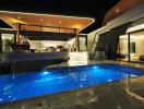 Modern house exterior with illuminated pool at night