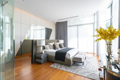 Modern bedroom with contemporary design and large windows