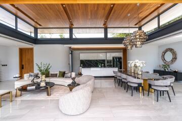 Modern living and dining area with open kitchen