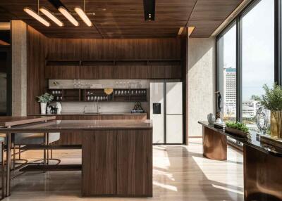 Modern kitchen with island and large windows