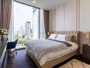 Modern bedroom with large window and city view