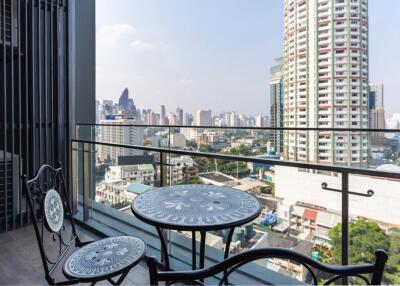 Balcony with city view and outdoor furniture