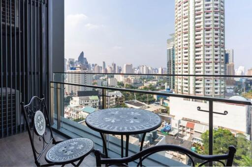 Balcony with city view and outdoor furniture