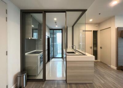 Modern kitchen with a glass partition