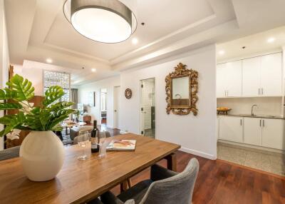 Dining area with a view of living room and kitchen