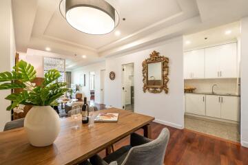 Dining area with a view of living room and kitchen