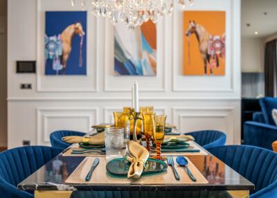 Sophisticated dining room with contemporary decor and a set dining table