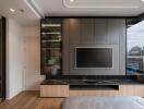 Modern bedroom with built-in entertainment unit